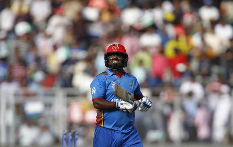 Afghanistan's Mohammad Shahzad reacts as he walks off the field after his dismissal during the World Twenty20 Cricket match againstSouth Africa in Mumbai, India, on March 3, 2017. Photo: Reuters