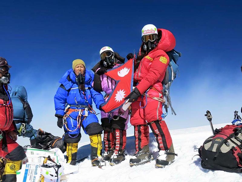 File - Maya Sherpa, Pasang Lhamu Sherpa and Dawa Yangjom Sherpa posing for photographs after summiting Mt K2 in Pakistan, in 2014. Photo courtesy: Maya Sherpa