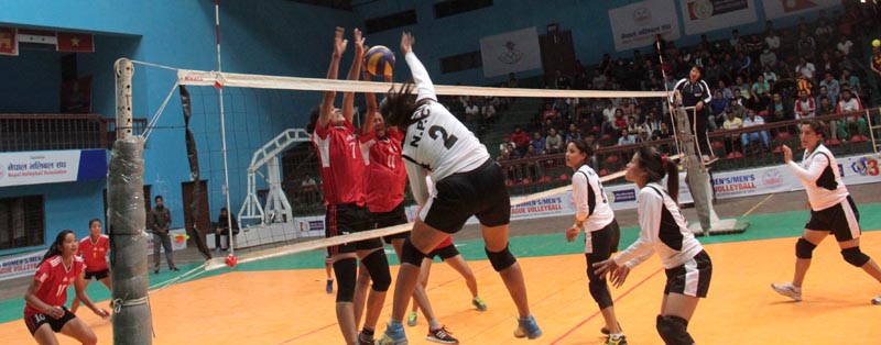 A player from NPC goes up for a spike against TAC during  their third RBB-NVA Women and Men Club League Volleyball Tournament Match in Kathmandu, on Tuesday, April 11, 2017. Photo: THT