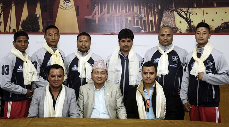 Boxers and officials with National Sports Council Member Secretary Keshab Kumar Bista (centre) and Nepal Boxing Association President Ram Awale (left) during a farewell programme in Lalitpur on Sunday, April 2, 2017. Photo: THT