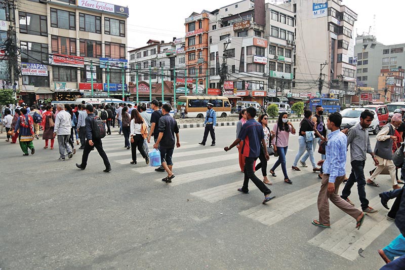 Pedestrians using a zebra crossing to cross a road in New Baneshwor, Kathmandu, on Friday, April 28, 2017. Photo: RSS