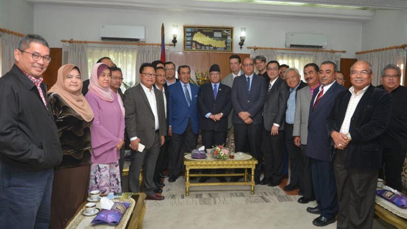 Prime Minister Pushpa Kamal Dahal with a delegation of Malaysian former administrators and businesspersons in Baluwatar on April 30, 2017. Photo: PM's Secretariat