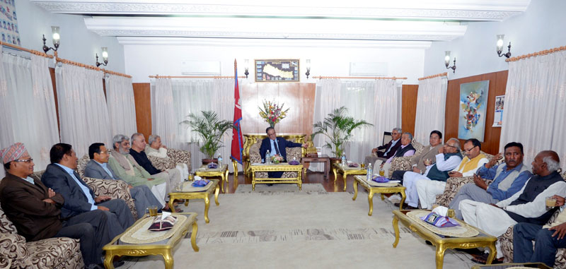Ruling parties holding a meeting with the UDMF leaders at Baluwatar on Friday. Photo: PM's Secretariat