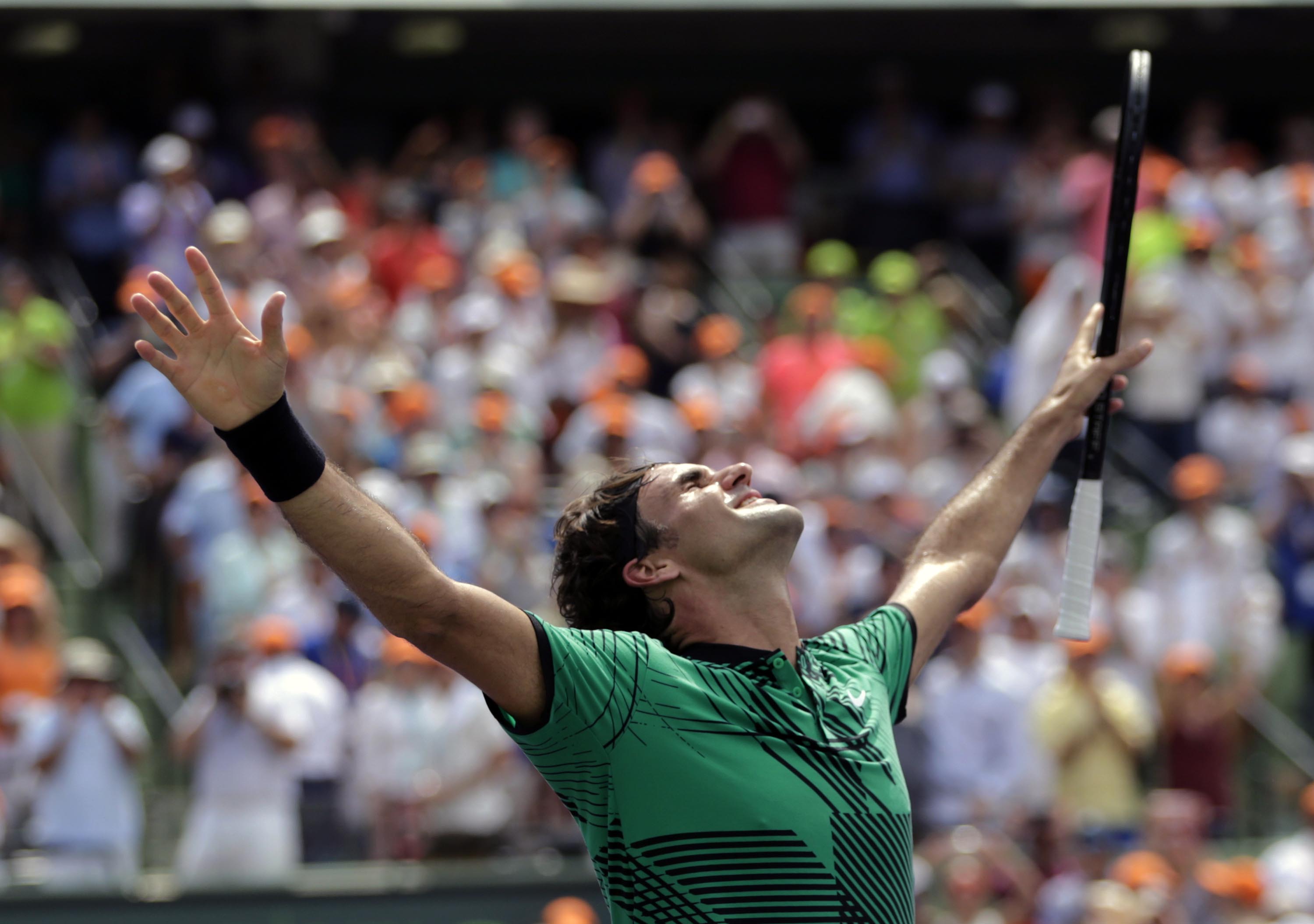 Roger Federer, of Switzerland, celebrates after defeating Rafael Nadal, of Spain, in the men's singles final at the Miami Open tennis tournament, in  Key Biscayne, Florida, on Sunday, April 2, 2017. Photo: AP