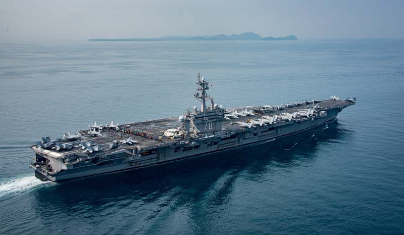FILE - The US aircraft carrier USS Carl Vinson transits the Sunda Strait, Indonesia, on April 15, 2017. Photo: Sean M. Castellano/Courtesy US Navy/Handout via Reuters