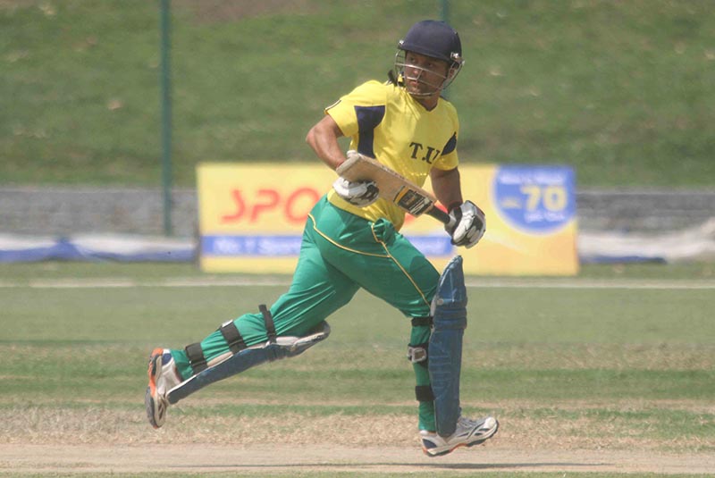 Rakesh Karn of TU Central Campus runs between the wickets during the University Cricket Cup match against Nepal Engineering Campus u2018Bu2019 in Kathmandu on Tuesday, April 4, 2017. Photo: THT