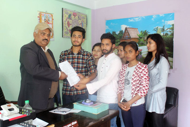 Youth activists submit a memorandum to Election Commissioner Ila Sharma in the run-up to the local level elections, at the Election Commission, in Kathmandu, on Friday, April 7, 2017. Photo courtesy: Deepak Sunuwar