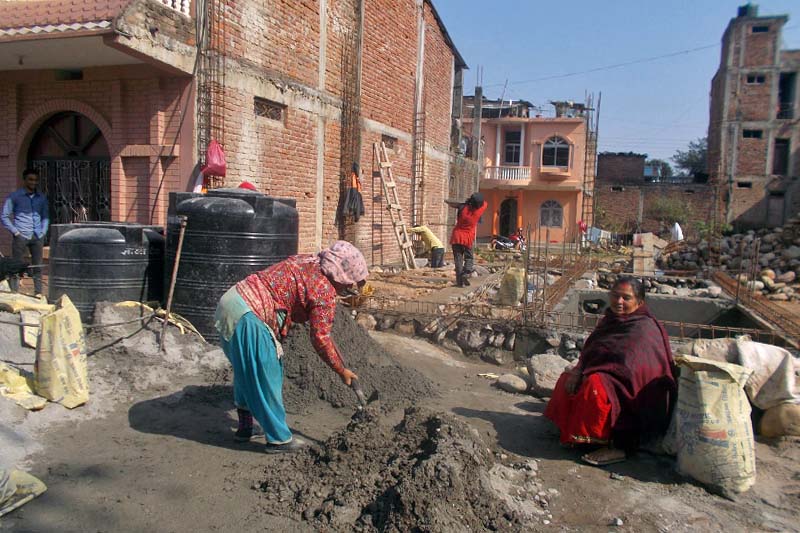 A woman works in a construction site in Rampur of Palpa district, on Friday, April 7, 2017. Even with equal amount of labour, women are paid less than men. Photo: RSS