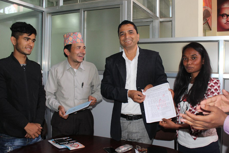 Youth activists submit a memorandum to CPN-UML Secretary Yogesh Bhattarai in the run-up to the local level elections in Kathmandu, on Sunday, April 9, 2017. Photo courtesy: Deepak Sunuwar