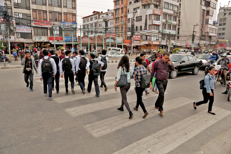 Pedestrians using a zebra crossing to cross a road in New Baneshwor, Kathmandu, on Friday, April 28, 2017. Photo: RSS
