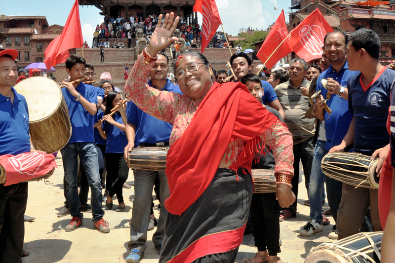 A woman clad in traditional attire dances as Nepal Workers Peasants Party emerges victorious in Bhaktapur, on Saturday, May 20, 2017. Photo: RSS