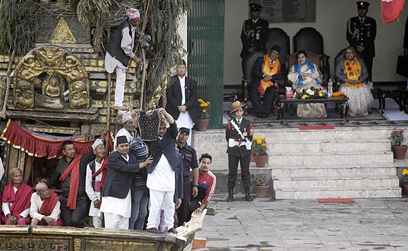President Bidhya Devi Bhandari flanked by Prime Minister Pushpa Kamal Dahal and Chief Justice Sushila Karki observing Bhoto Jatra, in Lalitpur, on Thursday, May 25, 2017. Photo: Naresh Shrestha/THT