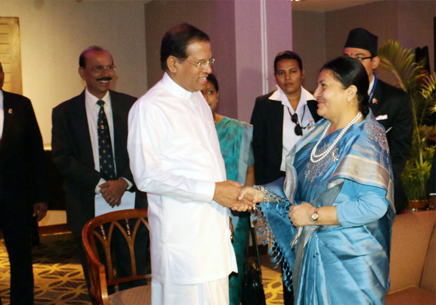Sri Lankan President Maithripala Sirisena (left) welcomes Nepali President Bidya Devi Bhandari during a tea reception organised by the former in his official residence in Kandy of Sri Lanka on Monday, May 15, 2016. Photo: RSS