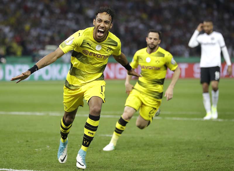 Dortmund's Pierre-Emerick Aubameyang (left), celebrates after scoring his side's 2nd goal during the German soccer cup final match between Borussia Dortmund and Eintracht Frankfurt in Berlin, Germany, on Saturday, May 27, 2017. Photo: AP