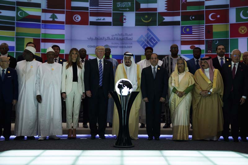 President Donald Trump and Saudi King Salman pose for photos after a ceremony to mark the opening of the Global Center for Combatting Extremist Ideology,  in Riyadh, on Sunday, May 21, 2017. Photo: AP