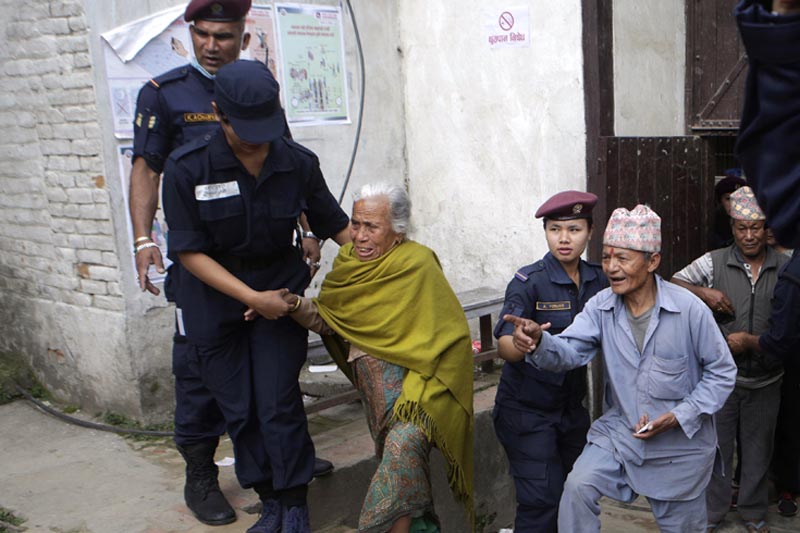 Nepali elderly people arrive at a polling centre to cast their votes during the local election in Bhaktapur, on Sunday, May 14, 2017. Photo: AP