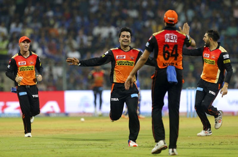 Sunrisers Hyderabad's Rashid Khan celebrates after Rohit Sharma's wicket during their Indian Premier League (IPL) cricket match against Mumbai Indians in Mumbai, India, on Wednesday, April 12, 2017. Photo: AP