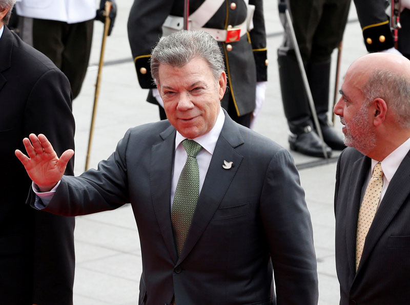 Colombia's President Juan Manuel Santos (L) arrives for the inauguration of President-elect Lenin Moreno (not pictured) at the National Assembly in Quito, Ecuador, on May 24, 2017. Photo: Reuters