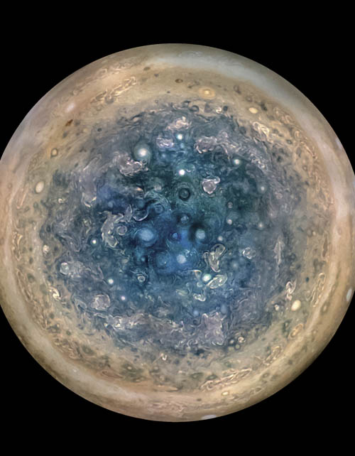 This image made available by NASA on Thursday, May 25, 2017, and made from data captured by the Juno spacecraft shows Jupiter's south pole. The oval features are cyclones, up to 600 miles (1,000 kilometers) in diameter. Photo: AP
