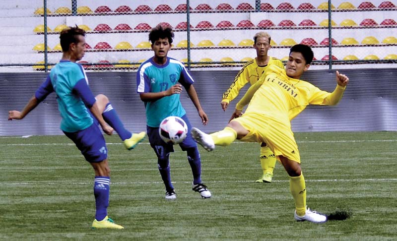 Players of Jagadamba Lumbini FC (right) and New Road Team vie for the ball during their Lalit Memorial U-18 Football Tournament match in Lalitpur on Sunday. Photo: Naresh Shrestha/ THT
