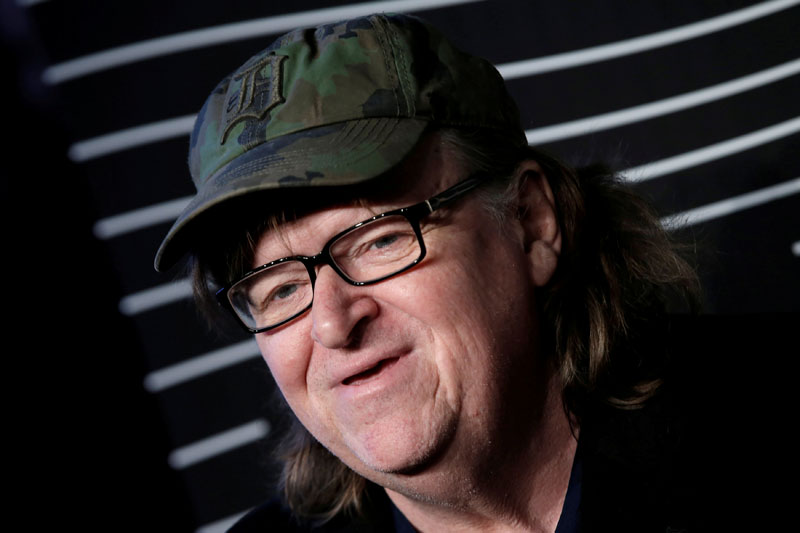 FILE - Filmmaker Michael Moore poses as he arrives for the 20th Annual Webby Awards in Manhattan, New York, US, on May 16, 2016. Photo: Reuters