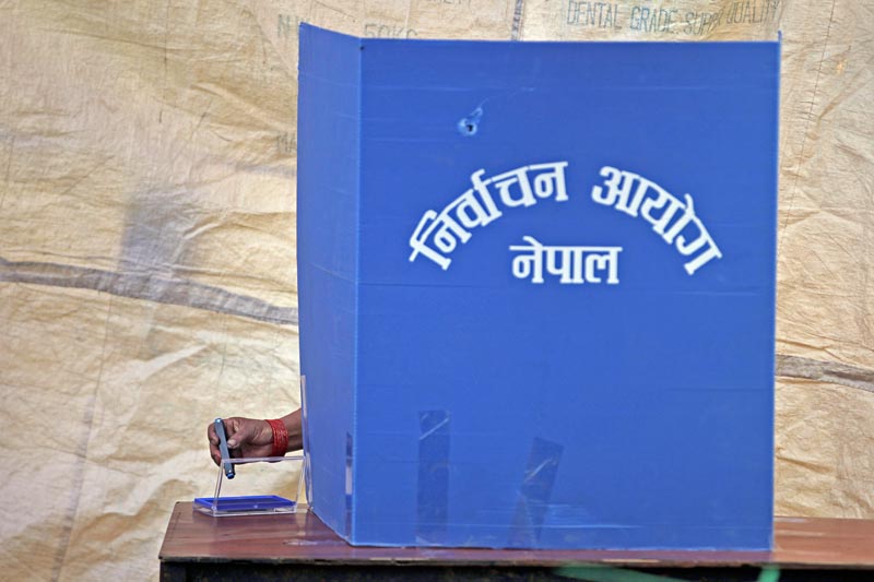 A Nepali woman casts her vote during the local election in Bhaktapur,on Sunday, May 14, 2017. Photo: AP