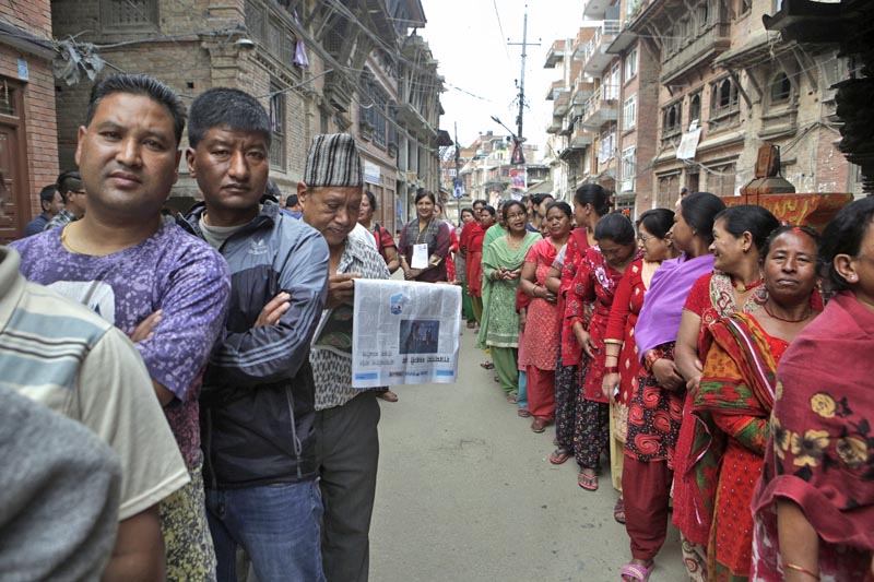 Nepalis stand in a queue to cast their votes at a polling station during the local election in Bhaktapur, on Sunday, May 14, 2017. Photo: AP