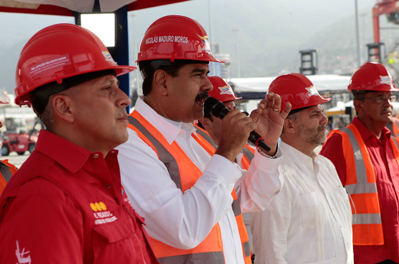Venezuela's President Nicolas Maduro (2nd from left) speaks during the opening ceremony of a container terminal at the port in La Guaira, Venezuela April 28, 2017. Picture taken April 28, 2017. Miraflores Palace via Reuters