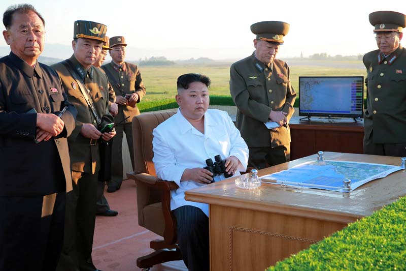 North Korean leader Kim Jong Un watches the test of a new-type anti-aircraft guided weapon system organised by the Academy of National Defence Science in this undated photo released by North Korea's Korean Central News Agency (KCNA) May 28, 2017. Photo: KCNA via Reuters