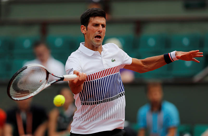 Serbia's Novak Djokovic in action during his first round match against Spain's Marcel Granollers. Photo: Reuters