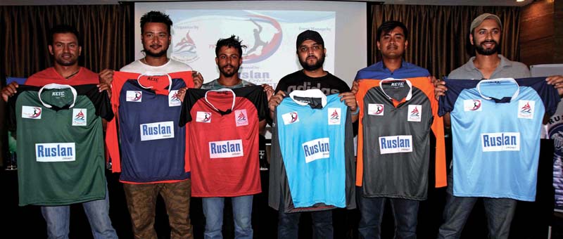 (From left) Participating teams' skippers Binod Bhandari, Manjeet Shrestha, Surendra Chand, Shubendhu Pandey, Gyanendra Malla and Sharad Vesawkar unveil their respective team jerseys during a press meet of the first Prime Minister Cup One-day National Menu0092s Cricket Tournament in Kathmandu on Monday. Photo: Udipt Singh Chhetry/ THT