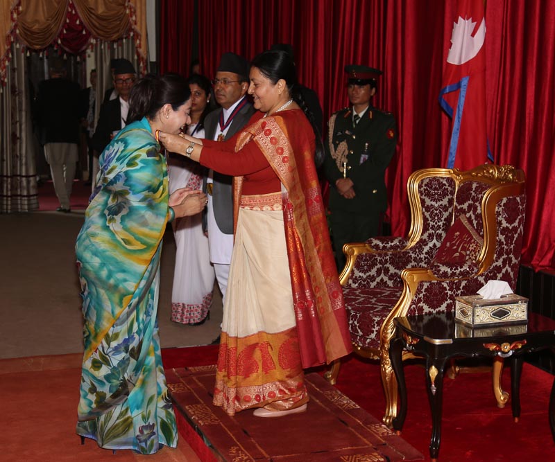 President Bidya Devi Bhandari conferring a decoration to a recipient on the occasion of the 9th Republic Day-2017 on May 26, 2017. A total of 258 persons were awarded decorations on the occasion.