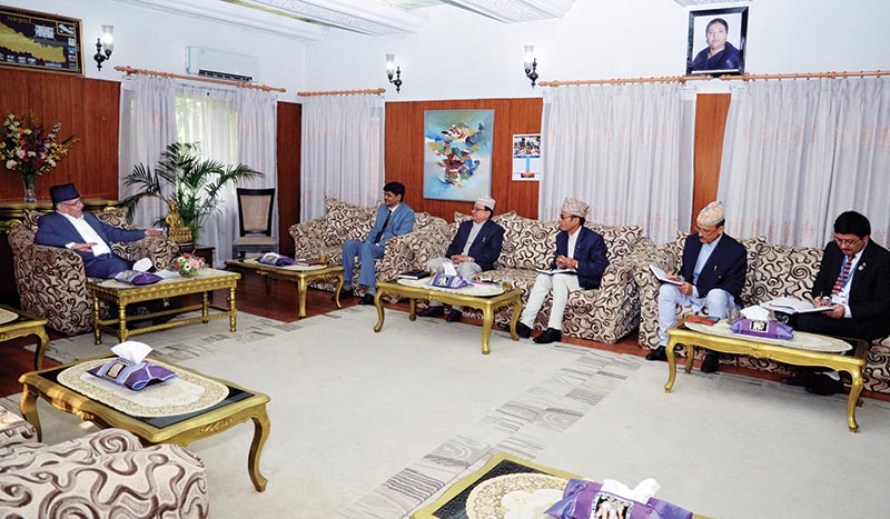 Prime Minister Pushpa Kamal Dahal holding a meeting with officials of the Election Commission, in Baluwatar, Kathmandu, on Sunday, May 21, 2017. Photo: RSS