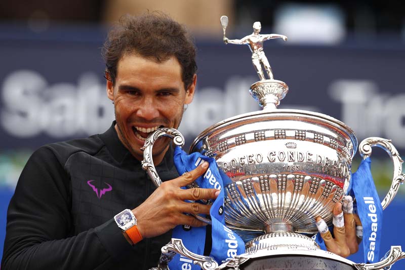Rafael Nadal of Spain poses with the trophy after winning his men's finals match 6-4, 6-1 against Dominic Thiem of Austria during their singles final match at the Barcelona Open Tennis Tournament in Barcelona, Spain, on Sunday, April 30, 2017. Photo: AP