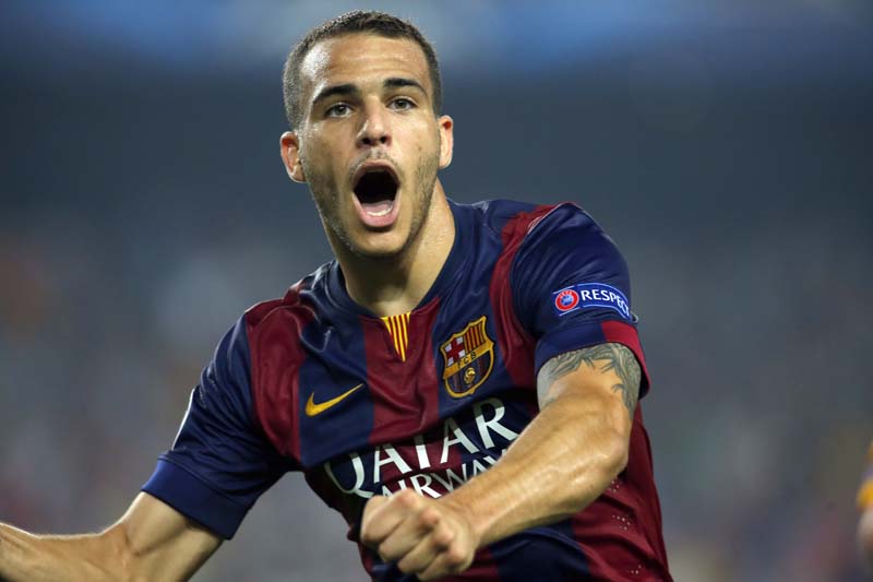 FILE - Barcelona's Sandro Ramirez celebrates after scoring his side's 3rd goal during the Champions League group F soccer match between F.C. Barcelona and Ajax at Camp Nou stadium in Barcelona, Spain, Tuesday, October 21, 2014. Photo: AP