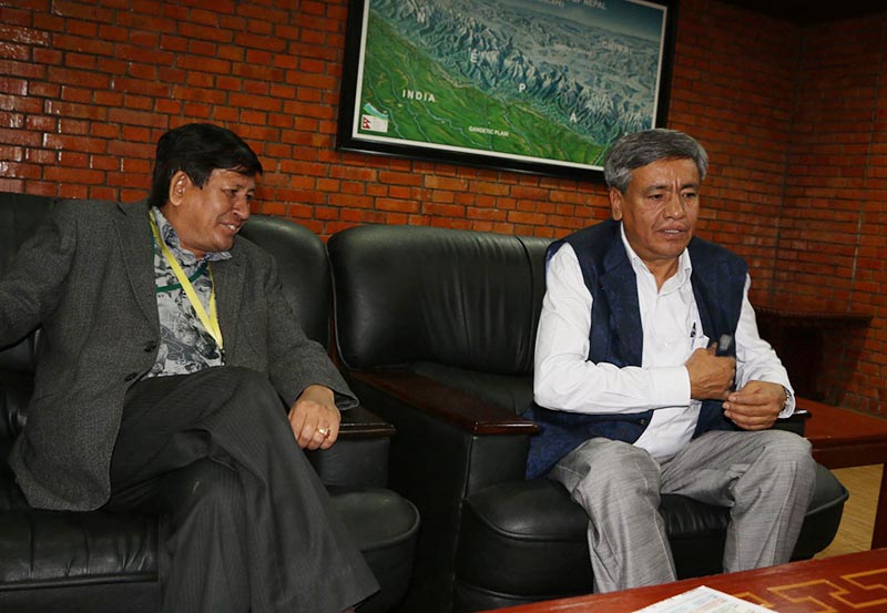 Minister for Information and Communications Surendra Kumar Karki (right) talking to mediapersons upon his arrival at Tribhuvan International Airport from Beijing, China, on Wednesday, May 17, 2017. Photo: RSS