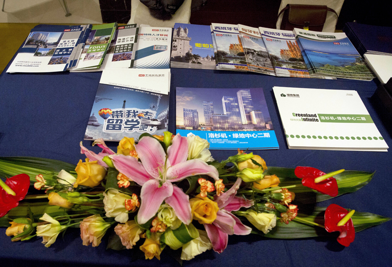 This Sunday, January 15, 2017 photo shows pamphlets about investment immigration to various countries displayed outside a seminar by an investment group pitching ski resorts and other projects as a way of securing a EB-5 visa to immigrate to the US in Beijing, China. Photo: AP