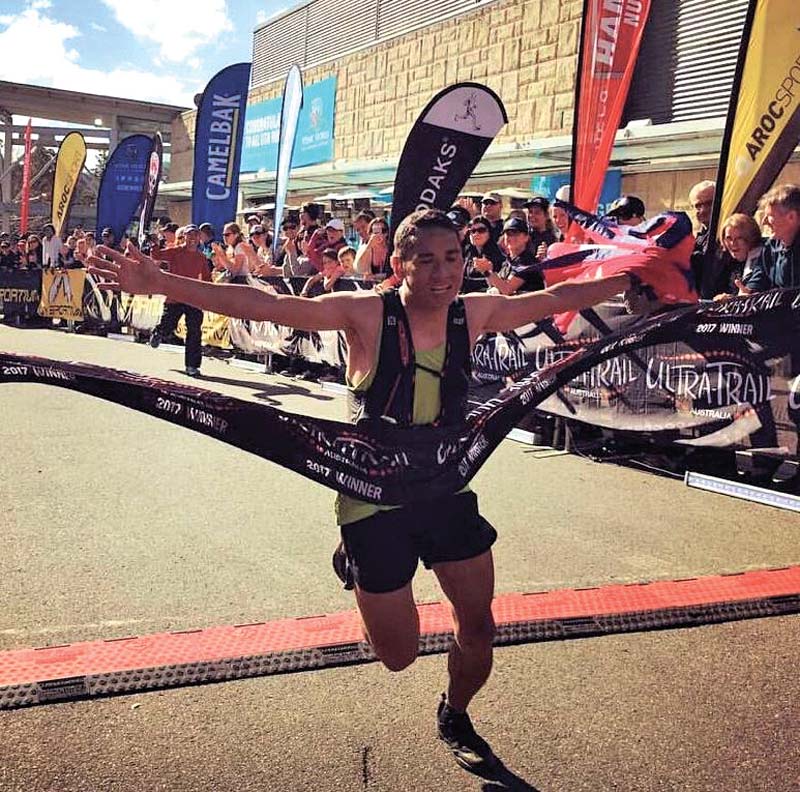 Nepal's Samir Tamang crosses the finish line of the 50km Ultra-Trail Australia in the Blue Mountains, Australia on Saturday.