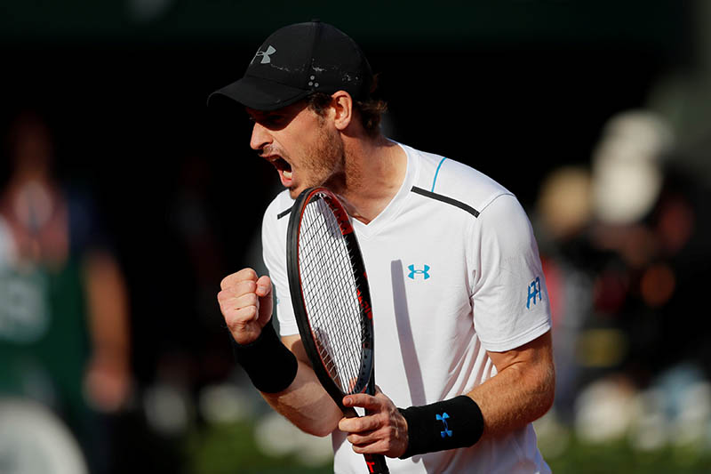 Great Britain's Andy Murray celebrates winning his quarter final match against Japan's Kei Nishikori. Photo: Reuters