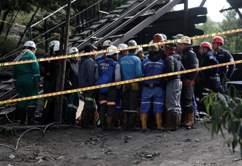 Rescue personnel coordinate to search for missing miners after an explosion at an underground coal mine on Friday, in Cucunuba, Colombia, on June 24, 2017. Photo: Reuters