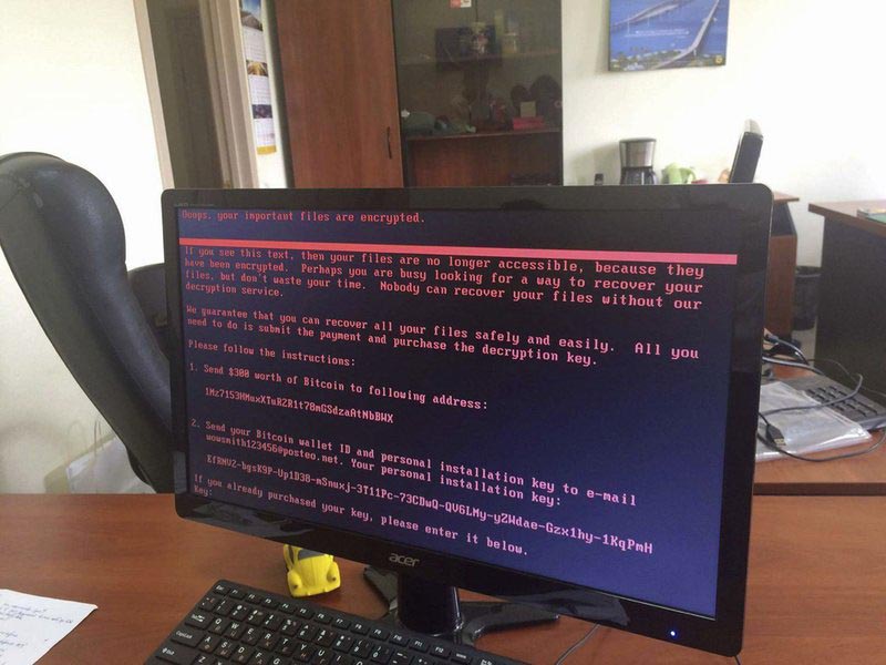 A computer screen cyberattack warning notice reportedly holding computer files to ransom, as part of a massive international cyberattack, at an office in Kiev, Ukraine, on Tuesday June 27, 2017. Photo: AP
