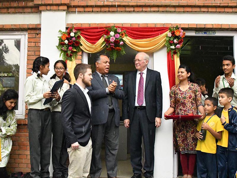 Former US Ambassador Theodore Kronmiller (centre right) and his son Michael Kronmiller (left) attend the inaugural session of  Science, Technology, Engineering, and Mathematics lab in Kanjirowa National Secondary School, Koteshwor, Kathmandu, on Thursday, June 8, 2017. Photo: THT