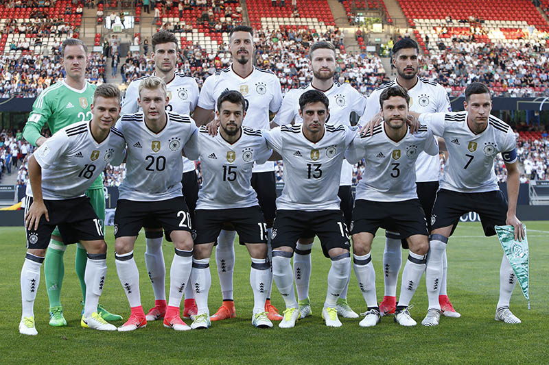 Germany players pose for team photo before the match. Photo: Reuters