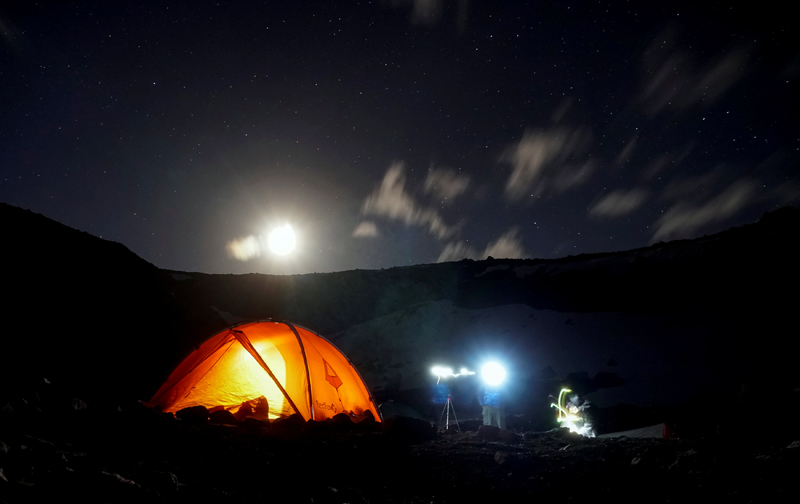 The Moon rises over a tourist camp set in the mountains of Tien Shan, outside Almaty, Kazakhstan June 18, 2017. Picture taken June 18, 2017. Photo: Reuters
