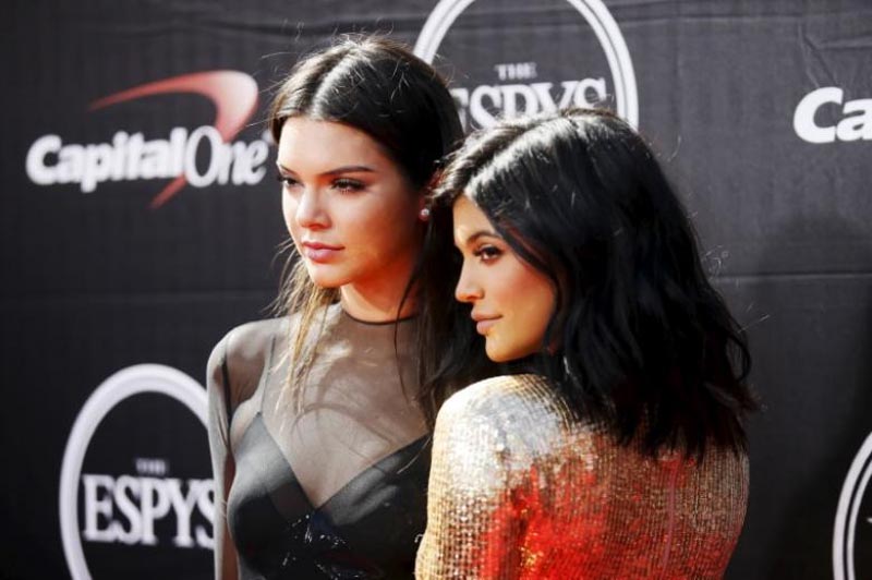 Kendall Jenner (left) and Kylie Jenner (right) arrive for the 2015 ESPY Awards in Los Angeles, California, on July 15, 2015.