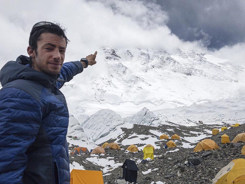 Kilian Jornet from Spain points towards Mount Everest in 2017. Photo:  Lymbus via AP