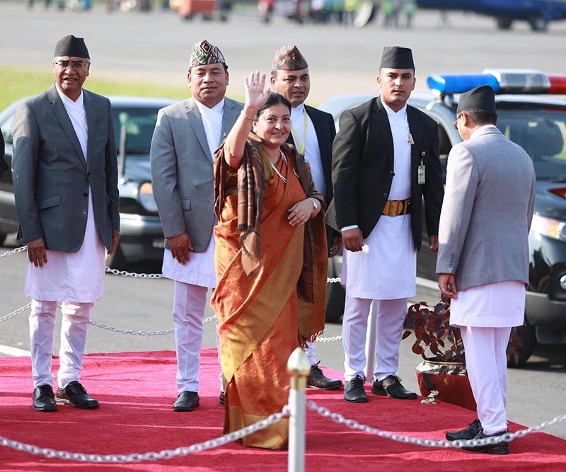 President Bidya Devi Bhandari waves as she leaves for Switzerland at the Tribhuvan International Airport, in Kathmandu, on Tuesday, June 13, 2017. Photo: RSS