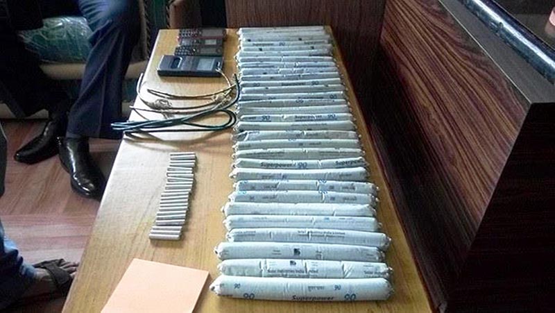 Rautahat District Police Office parades 30 gelatins, 22 detonators and 4 fuse devices and 4 mobile phone sets confiscated from two cadres of Netra Bikram Chand (Biplab)-led CPN Maoist, in Gaur, on Thursday, June 8, 2017. Photo: Prabhat Kumar Jha