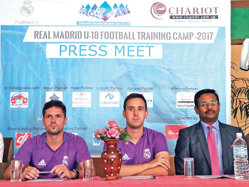 (From left) Real Madrid Foundation coaches Rafael Palacios and Daniel Landaburu Rotella with General Manager of Soaltee Crowne Plaza Upaul Majumdar at a press meet in Lalitpur, on Sunday. Photo: THT