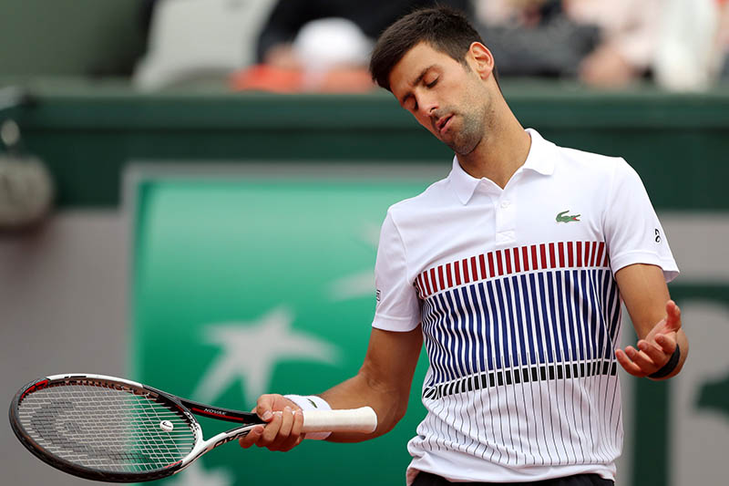 Serbia's Novak Djokovic reacts during his quarter final match. Photo: Reuters